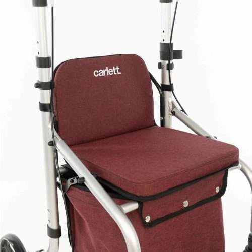 Detalle del asiento acolchado y cesta del andador rollator Lett Go color rojo