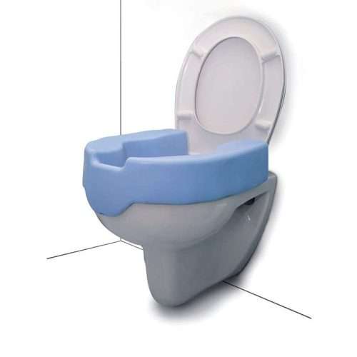 Asiento elevador para WC y bidet colocado sobre inodoro