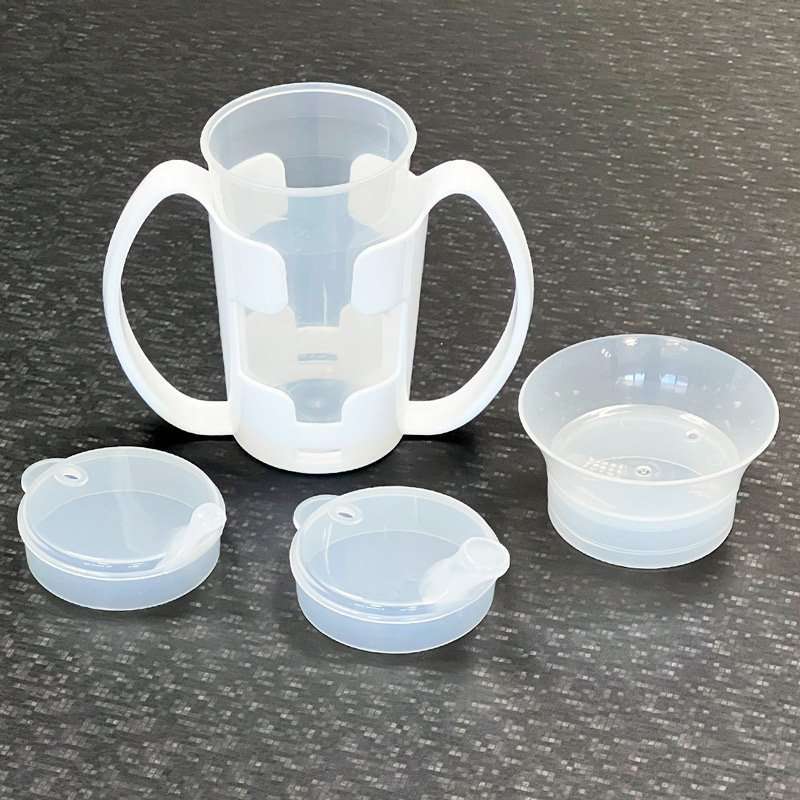 Sujeta vasos doble asa con vaso y tetinas intercambiables