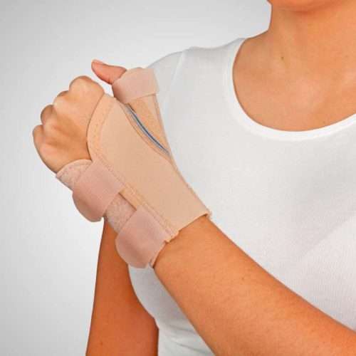 Muñequera de abducción de pulgar en color beige con cierre de velcro